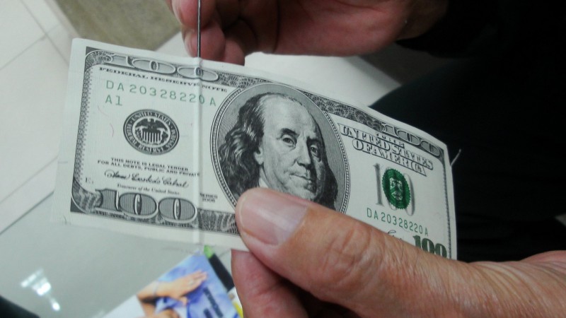Сыктывкарец осужден за хранение и сбыт поддельных долларов США

